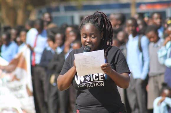 Mary Bwalya, one of our young change-makers presenting a position paper on the state of young people in Zambia during National Youth Day Commemorations