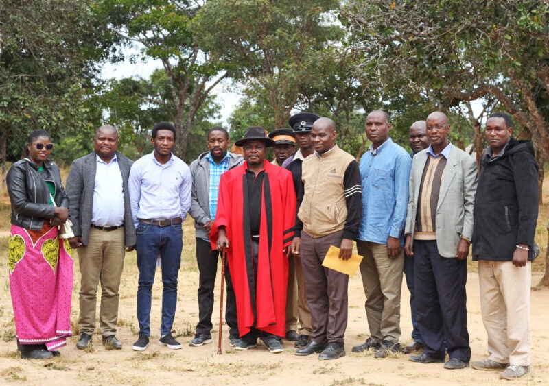 Representatives from Malcom Moffat College of Education, the Department of Child Development, Ministry of Health Zambia, Victim Support Unit, and Chiefs Affairs paying a courtesy call to Chief Mailo in Serenje District