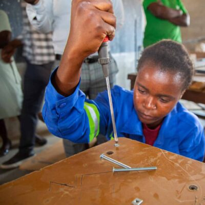 Pupil working with a screwdriver